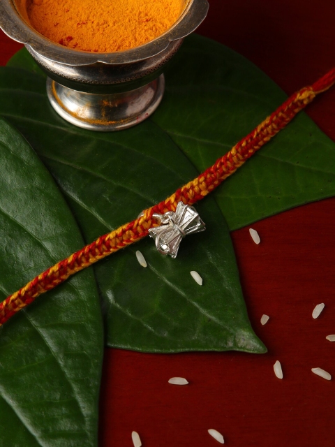 

Sepia Silver Toned & Red Quirky 925 Silver Rakhi