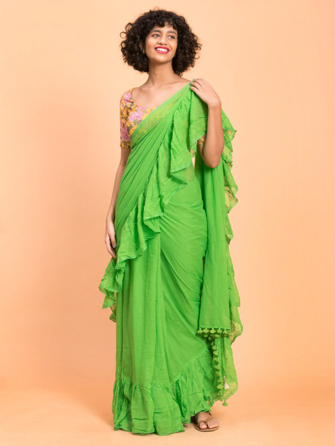 

Suta Green Solid Pure Cotton Ruffled Border Saree