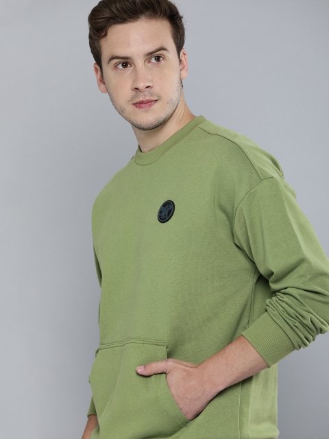 

Puma Men Green Solid Sweatshirt