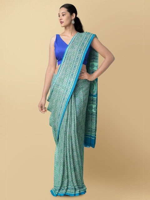 

Unnati Silks Green Ethnic Motifs Patola Sustainable Saree
