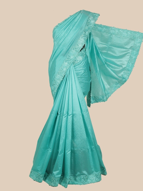 

Pothys Turquoise Blue Ethnic Motifs Beads and Stones Embellished Art Silk Saree