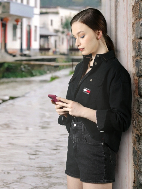 

Tommy Hilfiger Women Black Solid Opaque Casual Shirt with Applique