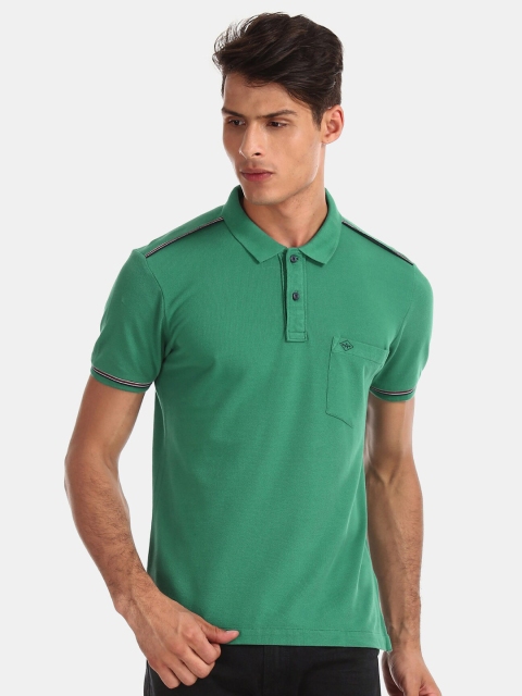 

Arrow Sport Men Green & Red Solid Taped Pique Regular Fit Polo Shirt