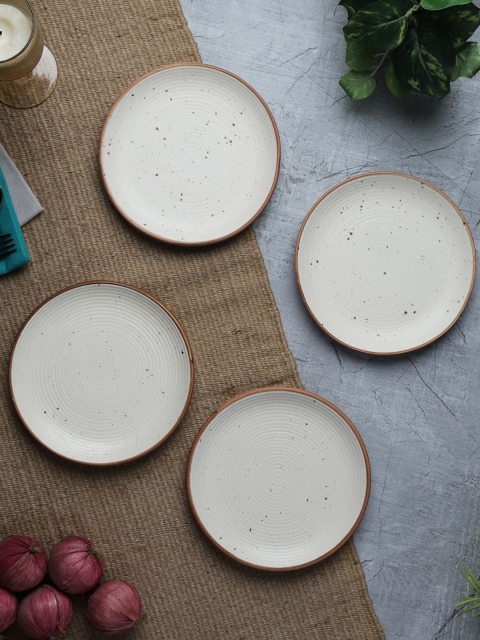 

The Decor Mart Off White 4 Pieces Ceramic Matte Plates
