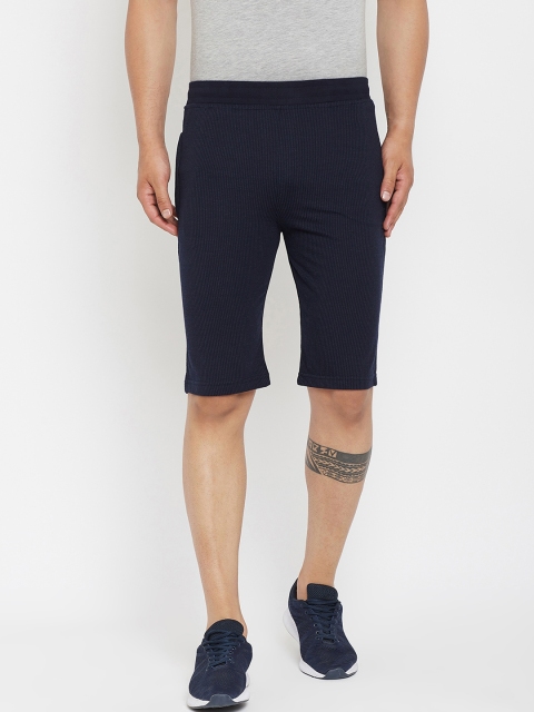 

Okane Men Navy Blue Solid Mid-Rise Regular Shorts