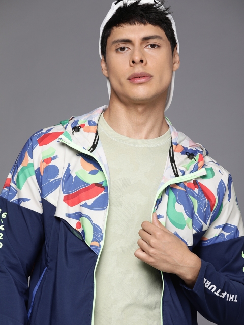 

Nike Men Blue & White Colourblocked WINDRUNNER ARTIST Sporty Hooded Jacket