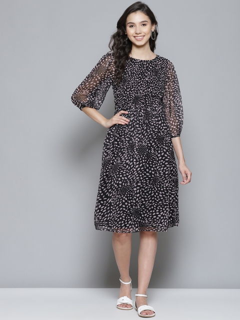 

Femella Women Black & Off White Printed A-Line Midi Dress