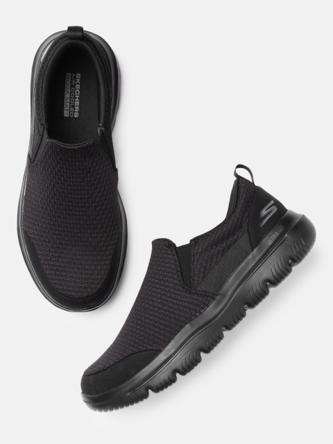 

Skechers Men Black Solid GO WALK EVOLUTION ULTRA- MOOD Walking Non-Marking Shoes