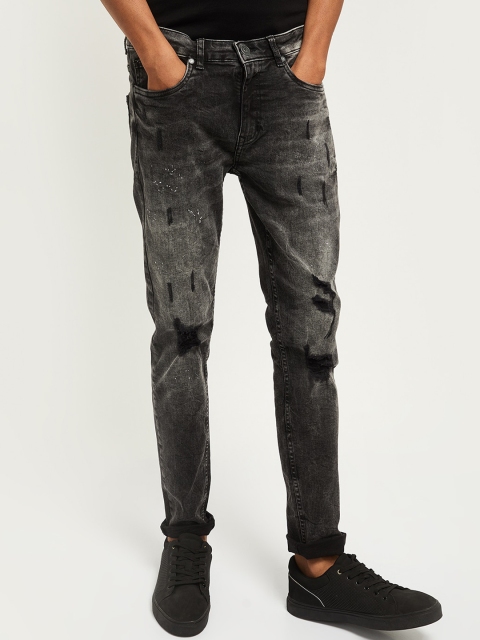 

max Men Black Highly Distressed Heavy Fade Stretchable Jeans