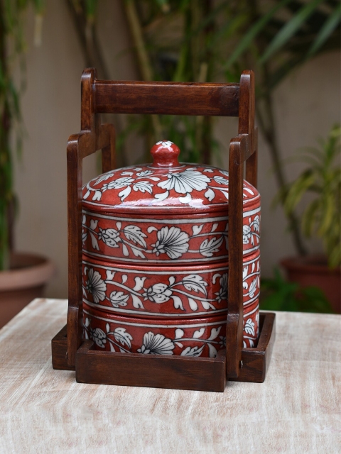 

Neerja Red & White Printed Pottery Tiffin Set with Wooden Stand