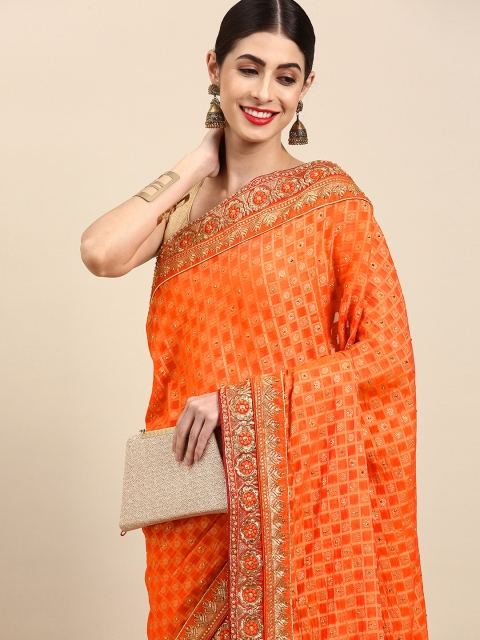 

Anouk Orange & Golden Ethnic Motifs Pattern Saree with Beaded Detail