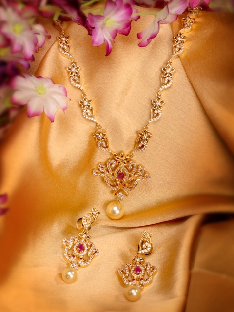 

Saraf RS Jewellery Gold Plated Traditional Pendant Style Necklace And Earrings Set, White