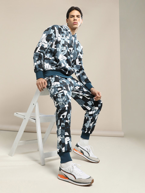 

PUMA Hoops Men Blue & White Printed Booster Joggers
