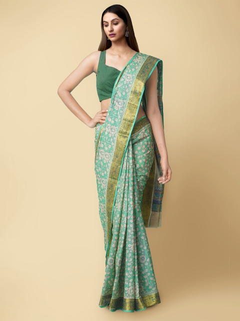 

Unnati Silks Green Ethnic Motifs Block Printed Jute Cotton Kasavu Saree