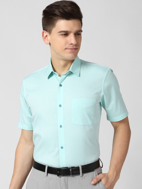 

Peter England Men Blue Solid Formal Shirt