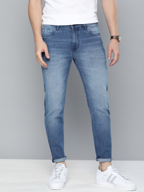 

Mast & Harbour Men Blue Carrot Fit Heavy Fade Mid-Rise Stretchable Jeans