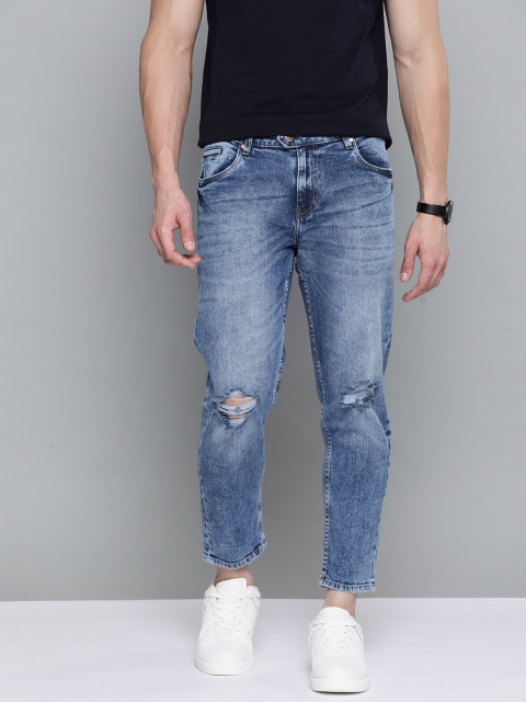

Mast & Harbour Men Blue Carrot Fit Slash Knee Light Fade Stretchable Jeans