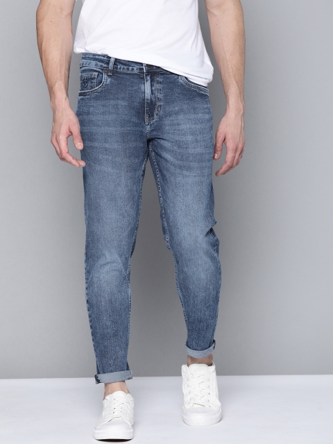 

Mast & Harbour Men Navy Blue Carrot Fit Light Fade Stretchable Jeans