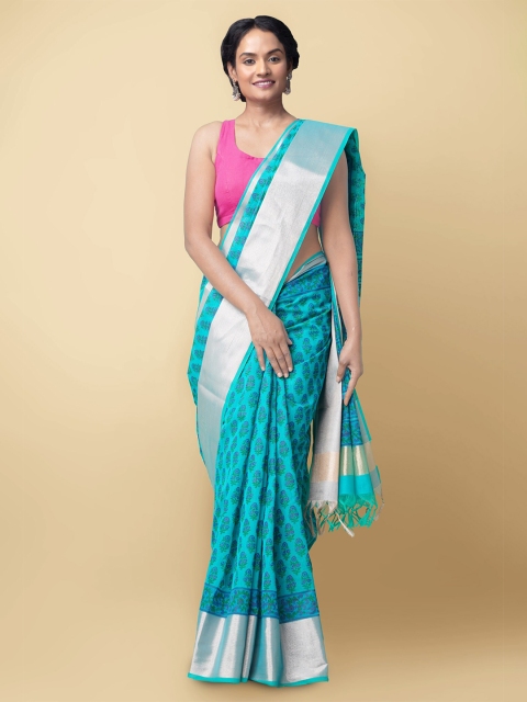 

Unnati Silks Sea Green & Silver-Toned Floral Zari Silk Cotton Chanderi Saree