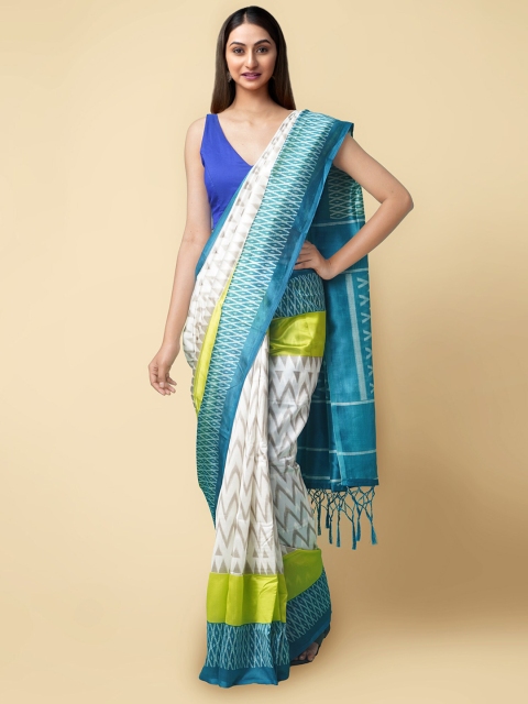 

Unnati Silks Cream-Coloured & Turquoise Blue Colourblocked Art Silk Patola Saree