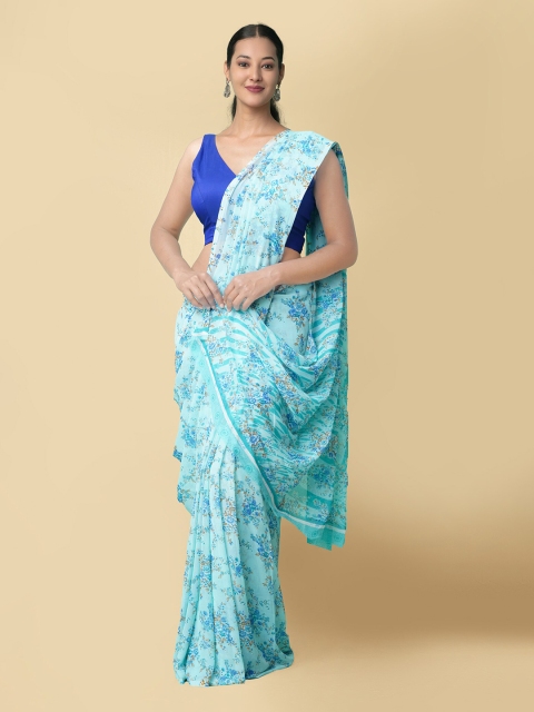 

Unnati Silks Blue & Brown Floral Patola Saree