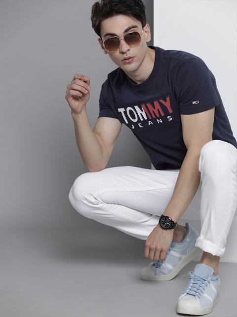 

Tommy Hilfiger Men Navy Blue Brand Logo Embossed Printed T-shirt