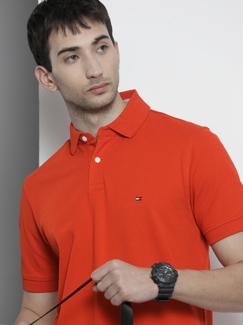 

Tommy Hilfiger Men Orange Solid Polo Collar T-shirt