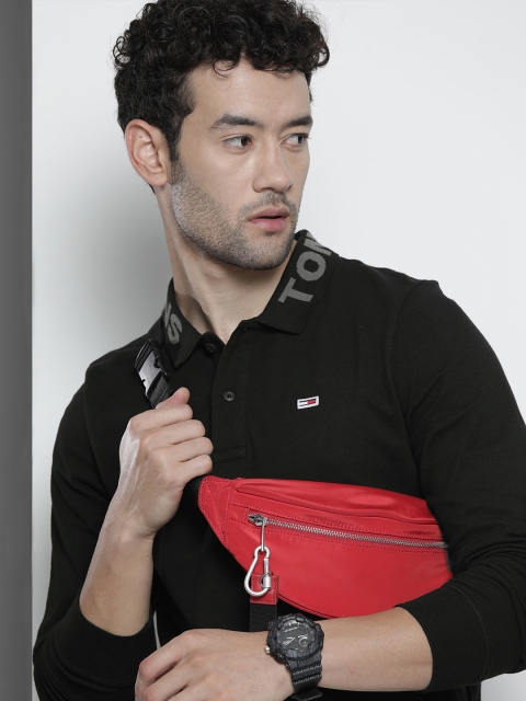 

Tommy Hilfiger Men Black Solid Polo Collar T-shirt