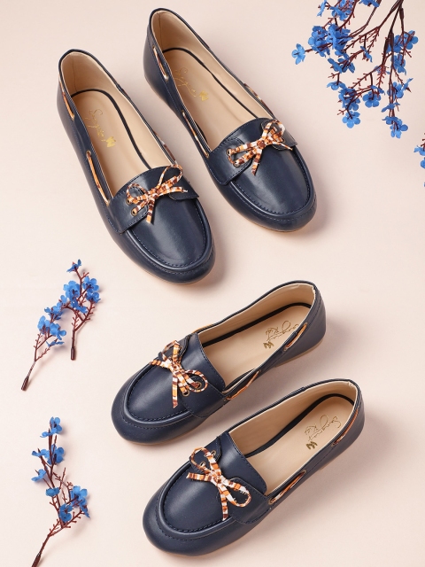 

Sangria Girls Navy Blue Solid Boat Shoes with Bow Detail