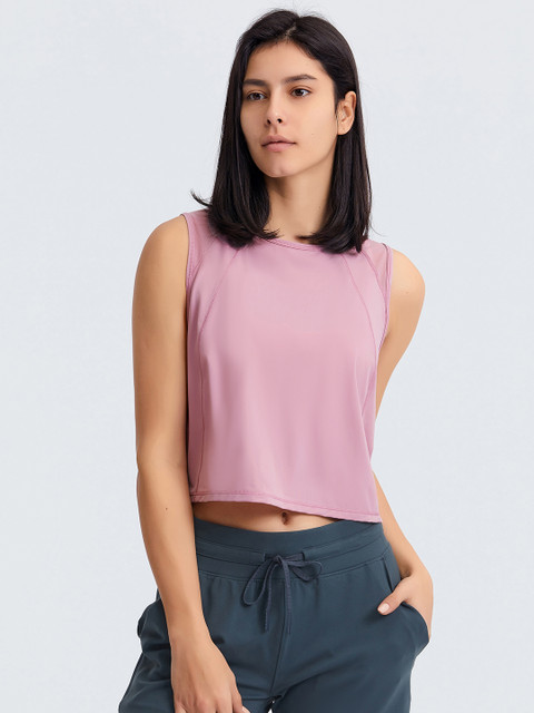 

URBANIC Pink Solid Styled Back Crop Top