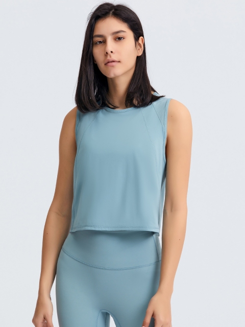 

URBANIC Blue Solid Styled Back Crop Top