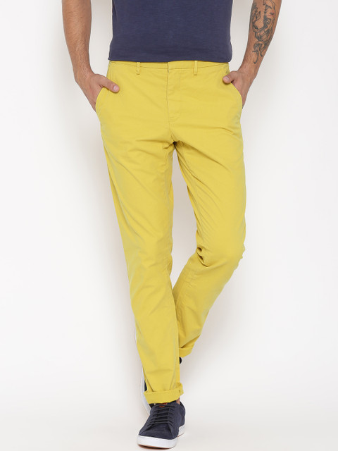 

Tommy Hilfiger Men Yellow Solid Mercer Fit Chino Trousers