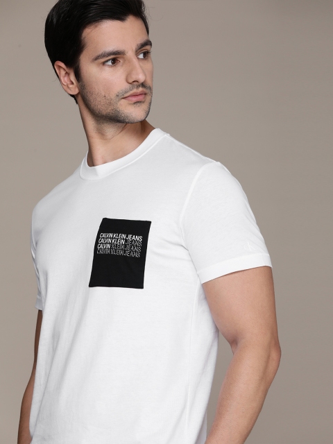 

Calvin Klein Jeans Men White Brand Logo Print Pocket Detail Pure Cotton T-shirt