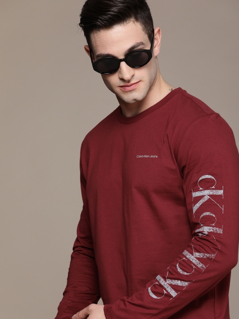 

Calvin Klein Jeans Men Maroon Brand Logo Printed Pure Cotton Casual T-shirt