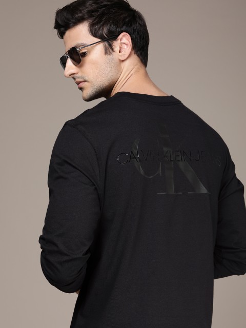 

Calvin Klein Jeans Men Black Logo Printed Casual T-shirt With Chest Pocket