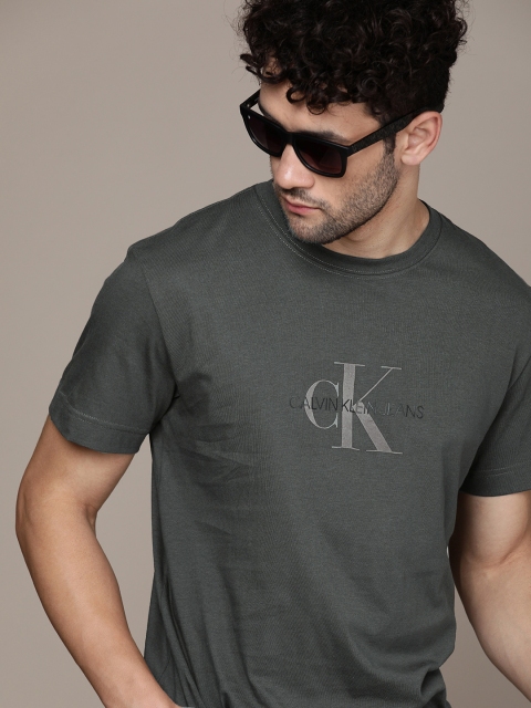 

Calvin Klein Jeans Men Grey Logo Printed Regular Fit Pure Cotton Casual Pure Cotton T-shirt