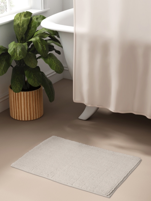 

Aura Off-White Patterned Bath Rug