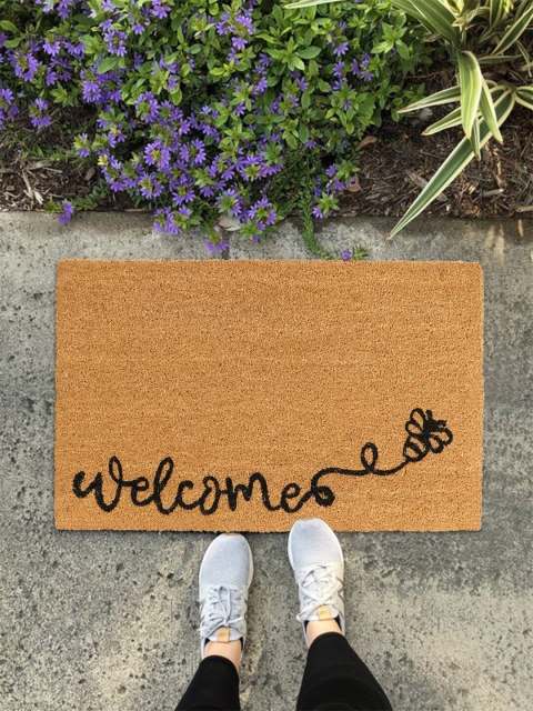 

HomeStorie Beige & Black Printed Anti-Skid Rectangular Doormat