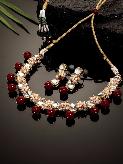 

KARATCART Gold-Plated White & Red Kundan-Studded & Pearl Beaded Handcrafted Jewellery Set