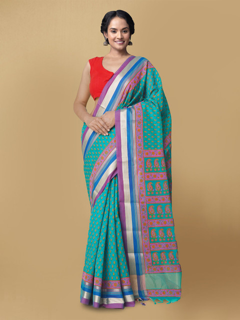 

Unnati Silks Turquoise Blue & Orange Ethnic Motifs Silk Cotton Chanderi Saree