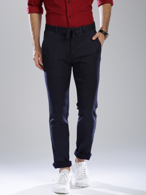 

Tommy Hilfiger Men Navy Solid Denton Regular Fit Chinos Trousers, Navy blue