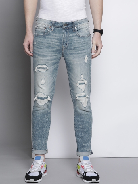 

AMERICAN EAGLE OUTFITTERS Men Blue Skinny Fit Highly Distressed Heavy Fade Stretchable Jeans