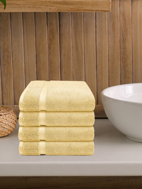 

Trident Set Of 4 Yellow Solid Pure Cotton 535 GSM Hand Towels