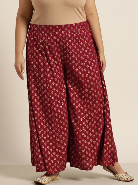 

Juniper Plus Women Maroon & Gold-Toned Ethnic Motifs Printed Flared Liva Ethnic Palazzos