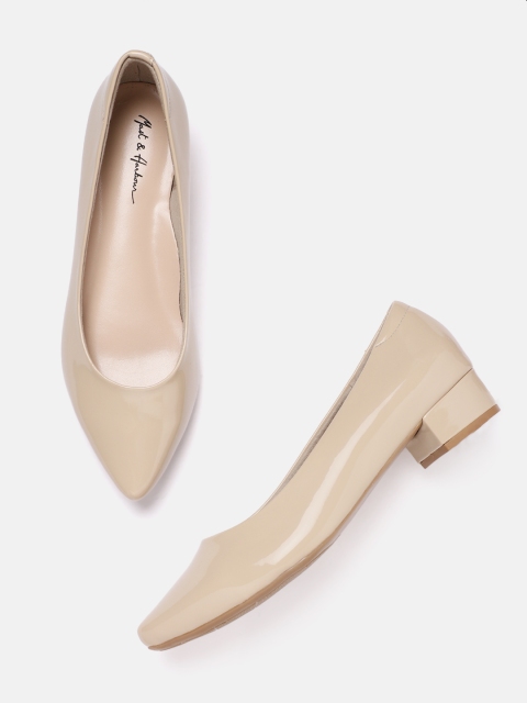 

Mast & Harbour Women Beige Solid Patent Finish Ballerinas