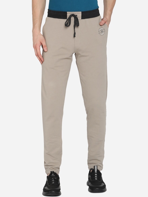 

JADE BLUE Men Beige Solid Pure Cotton Track Pants