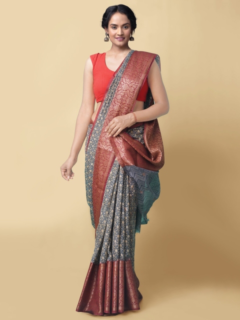

Unnati Silks Grey & Brown Floral Printed Zari Silk Cotton Maheshwari Saree