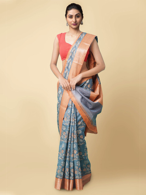 

Unnati Silks Blue & Orange Floral Handloom Sustainable Silk Cotton Ajrakh Maheshwari Saree