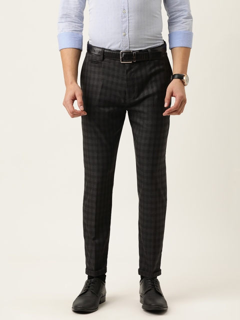 

Peter England Men Black Carrot Fit Checked Formal Trousers