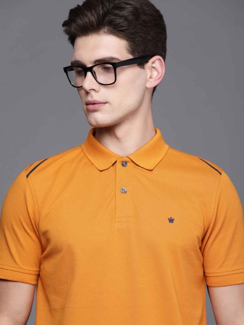 

Louis Philippe Men Orange Polo Collar T-shirt